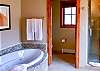 Master bathroom with jetted tub and walk-in shower