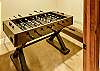 Foosball table in basement game room