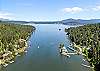 Your private slice of Lake Coeur d’Alene—complete with a dock and paddleboards for endless adventure.