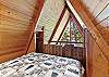 King bed in loft area