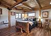The main bedroom features a king bed and an en suite bathroom