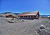 Homestake cabin with a large driveway.