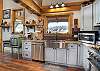 Fully equipped kitchen with gas range and island