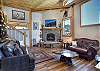 Living room with Smart TV and large windows
