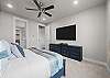 Main bedroom suite complete with 75 inch smart TV.