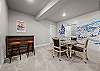 Challenge accepted! From foosball to poker to vintage arcade—this game room brings the fun.