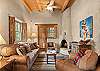 Step into the open living room with plush seating