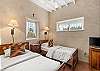 Two twin beds with Smart TV