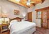 Primary King Bedroom with dual nightstands
