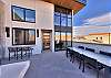 Front patio with outdoor dining and grill