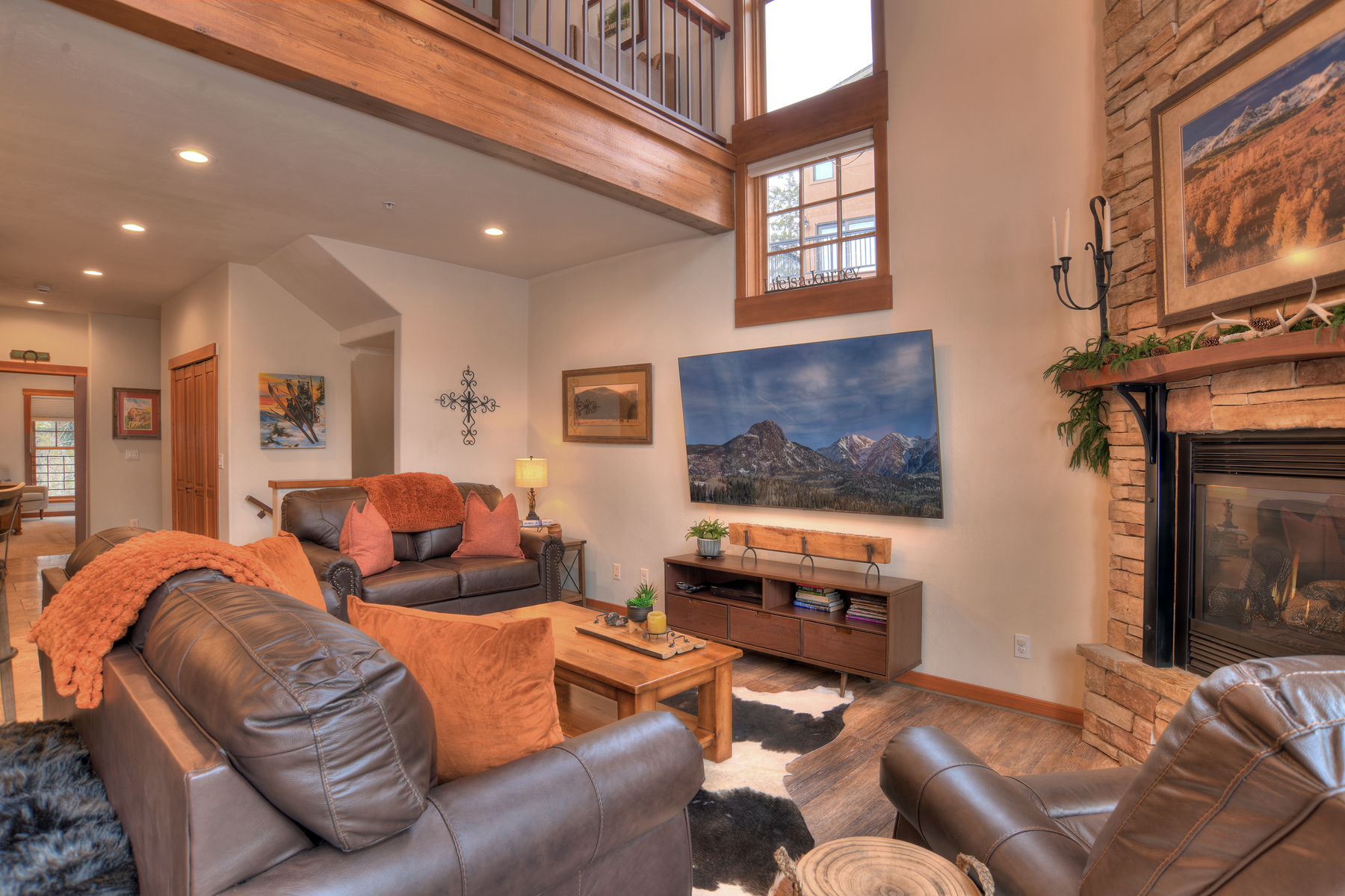 Main Living Space - TV, Gas Fireplace and Deck