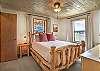 Queen bedroom with ensuite bathroom on the main level. 