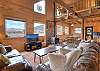 Open living, dining and kitchen with loft. 