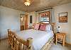 Second bedroom with queen bed and ensuite bathroom. 