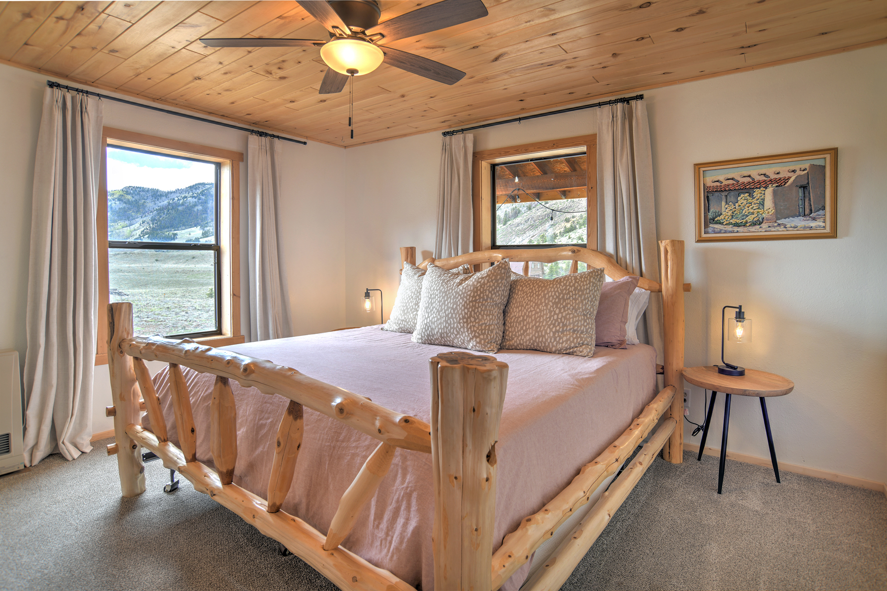 Main bedroom with king bed and ensuite bathroom