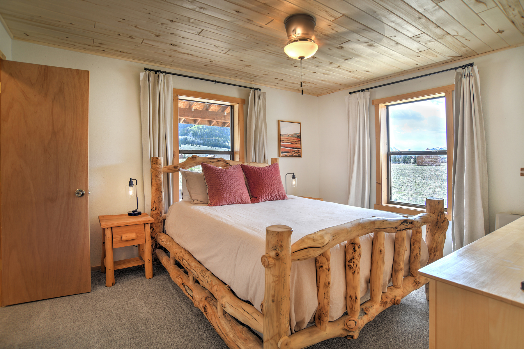 Queen bedroom with ensuite bathroom on the main level. 