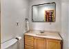 Main level 1/2 bathroom off living area. 