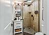 The second bathroom consists of a walk-in shower