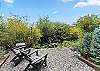 Unwind and enjoy the view from this inviting outdoor seating area