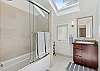 Dual vanities and tub/shower combo