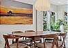 Comfortably sits 6 guests with additional seating at the kitchen counter 