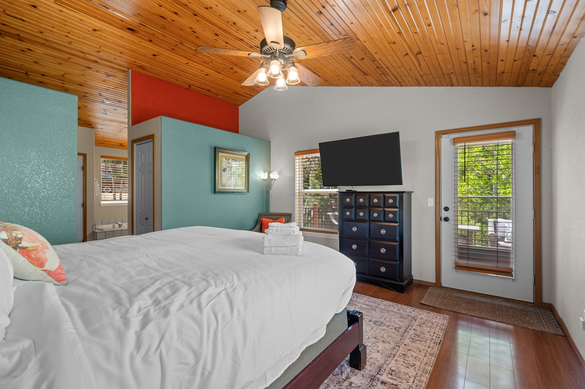 King bedroom on the main level with Smart TV and ensuite bathroom