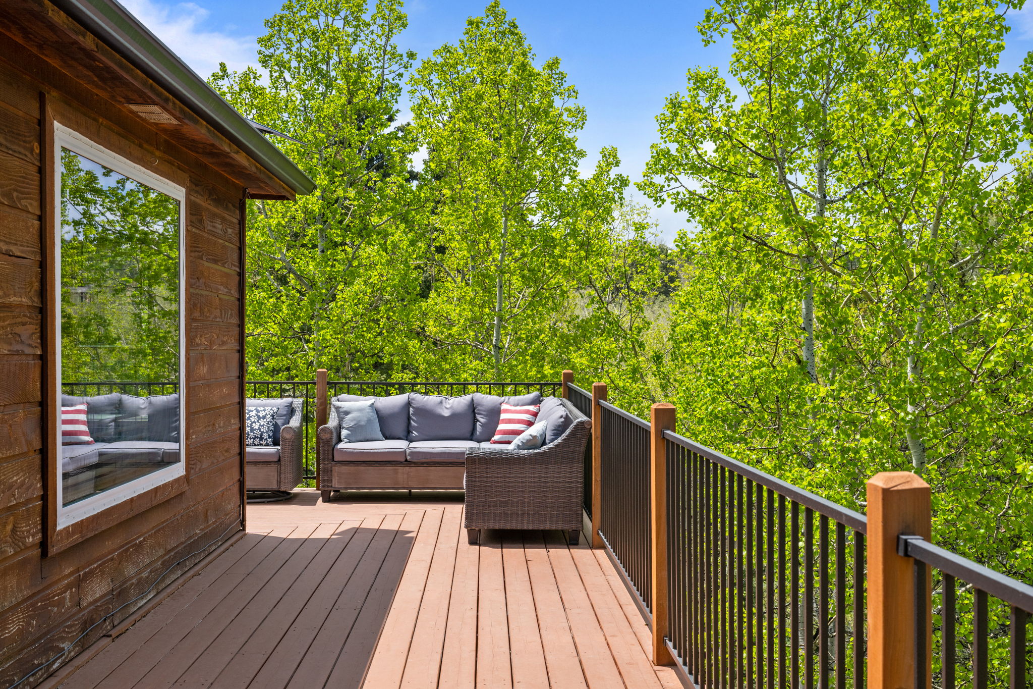 Relax, grill, and enjoy the view—this spacious wrap-around deck has it all.
