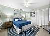Primary Queen Bedroom with overhead fan