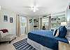 Queen bedroom with ample natural light 