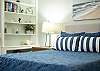 Well-appointed queen bedroom designed for a restful night’s sleep.
