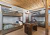 The third bedroom features two twin over twin bunk beds - 4 twins total