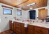 Walk-in shower and dual vanities
