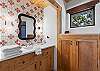 Full bathroom featuring a sleek walk-in shower.
