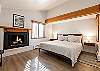 Primary King Bedroom with a private fireplace