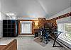 The second bedroom with the Queen sleeper sofa includes a workplace station