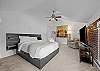 Well-appointed queen bedroom designed for a restful night’s sleep.
