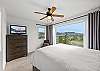 Well-appointed queen bedroom designed for a restful night’s sleep.
