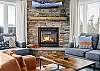Cozy up by the fireplace