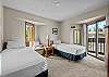 Unwind in this spacious double twin bedroom with a Smart TV—comfort and entertainment in one. 