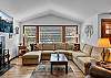 Cozy up in style- this living room is perfect for relaxation and gathering.
