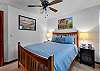 Well-appointed queen bedroom designed for a restful night’s sleep.
