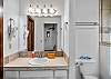 Full bathroom featuring a sleek walk-in shower.
