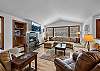 Cozy up in style- this living room is perfect for relaxation and gathering. Fireplace is not for use May-Sept.