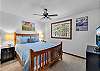 Relax and recharge in this cozy queen bedroom retreat.
