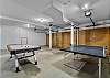 Air hockey and ping pong table in garage