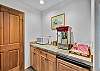 
Popcorn maker, microwave and mini fridge downstairs in living area