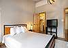 Bright and clean queen bedroom, perfect for a comfortable stay - located on the main floor
