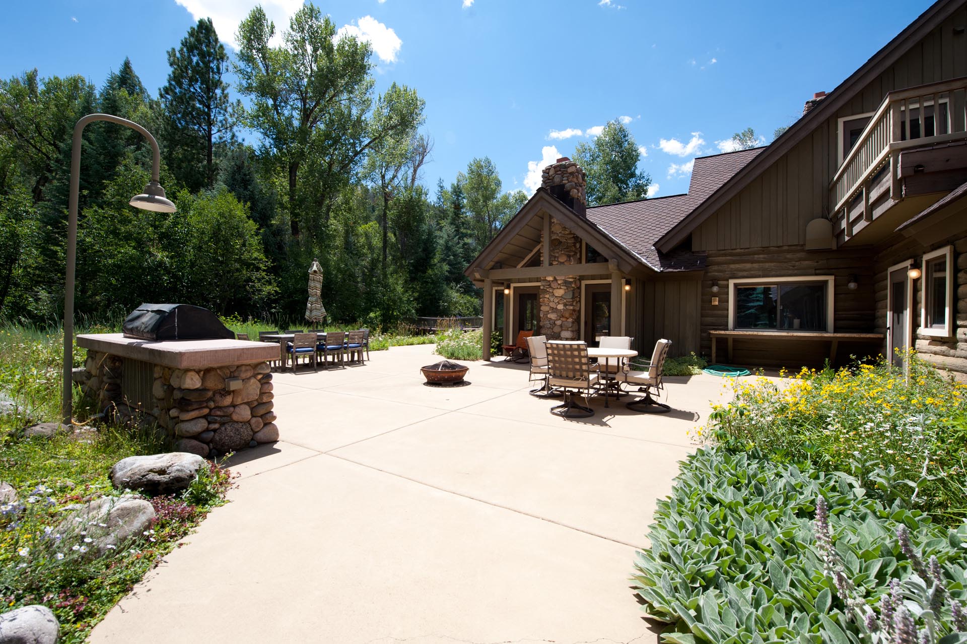 Built in BBQ Grill, outdoor dining table and additional seating