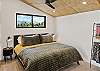 King bedroom with overhead fan