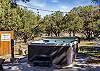 Private hot tub with mountain views.